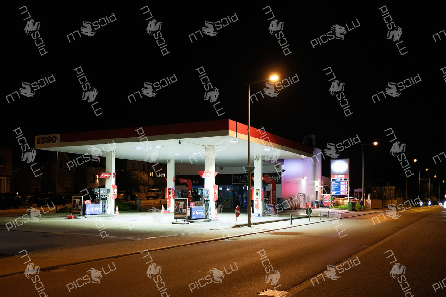 Night view of an Esso gas station in Luxembourg