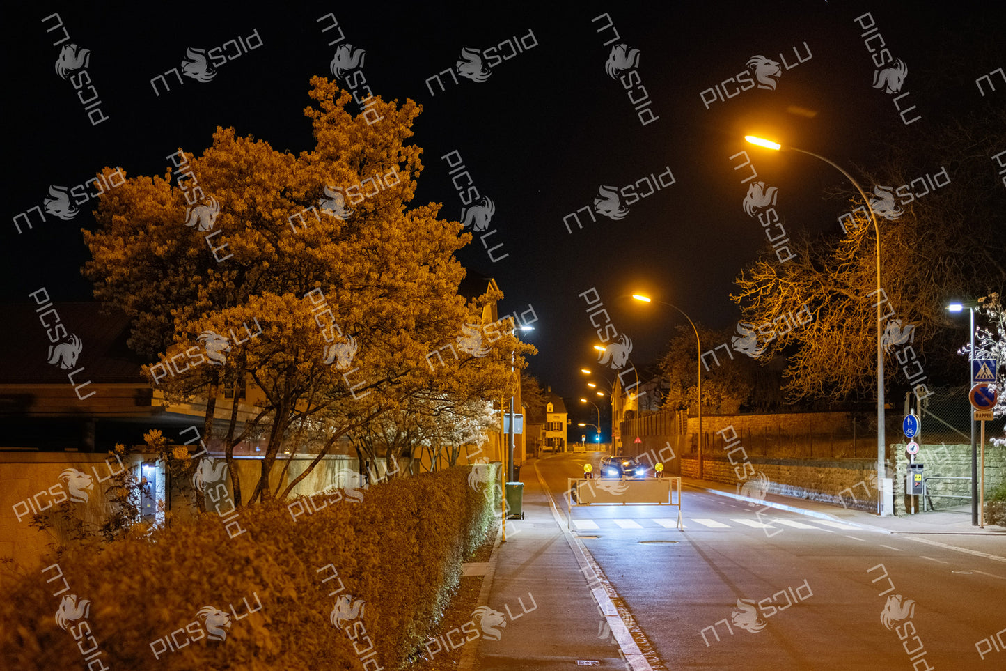 Nighttime street scene in Sandweiler, Luxembourg