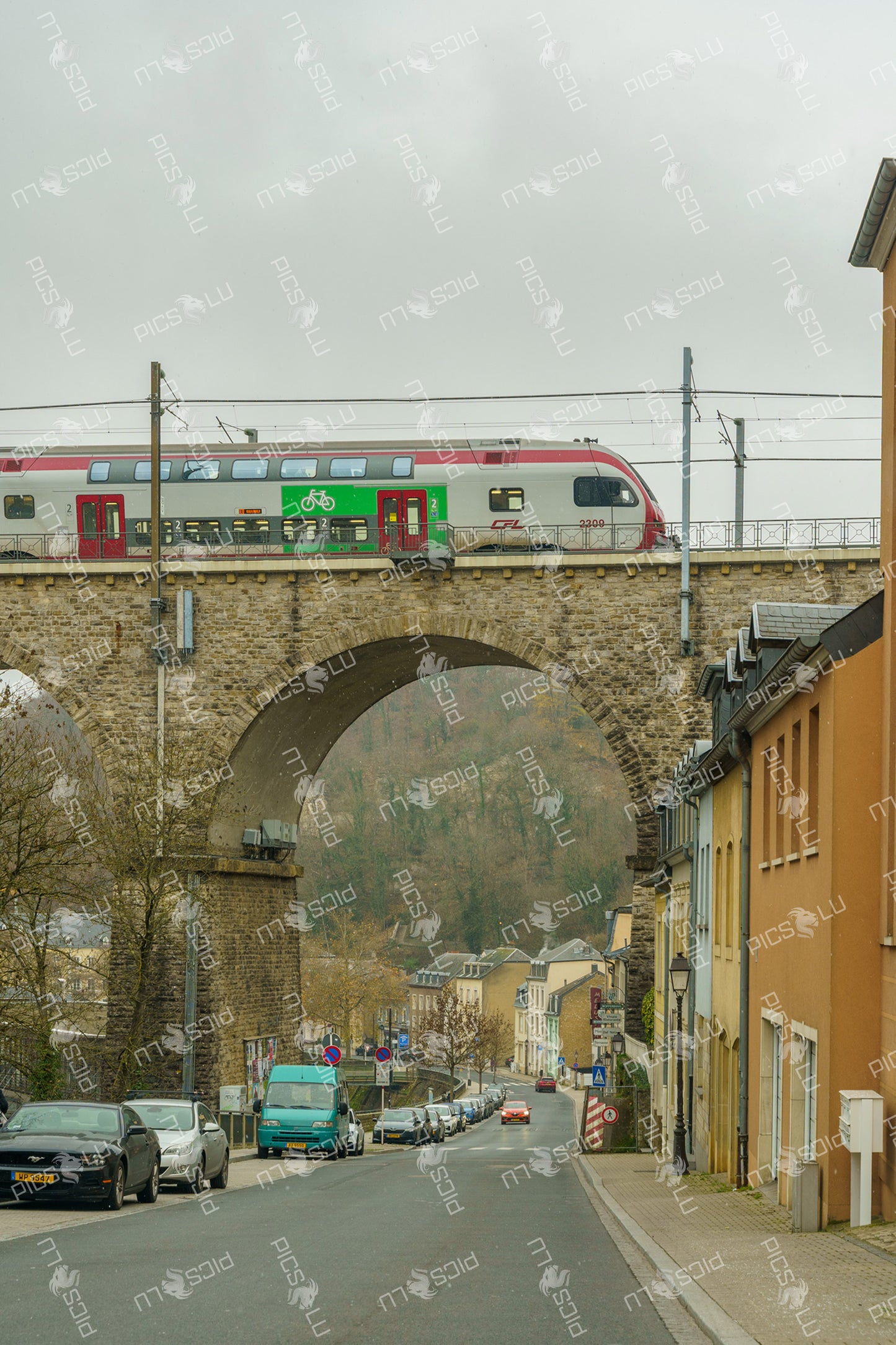 CFL train crossing stone viaduct in Pfaffenthal, Luxembourg