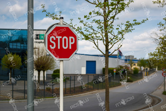 Stop sign near Hospilux building in Contern, Luxembourg