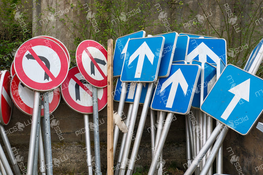 Directional and prohibition road signs stacked in Contern, Luxembourg