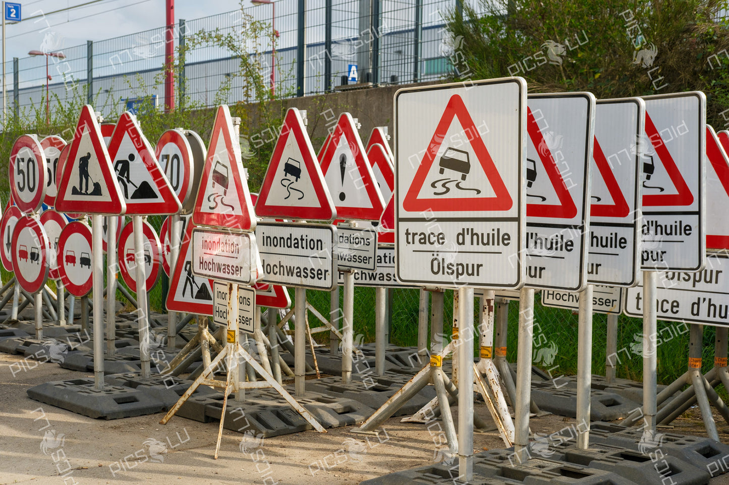 Traffic signs for roadwork and hazards in Contern, Luxembourg
