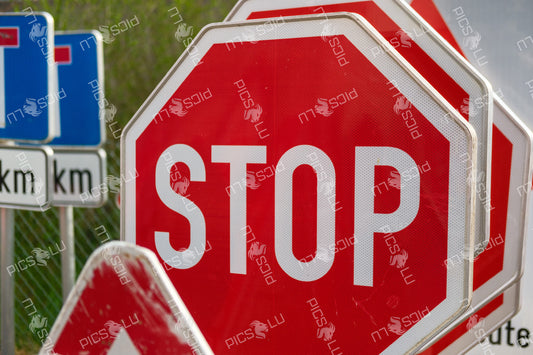 Stop signs and road markers in Contern, Luxembourg