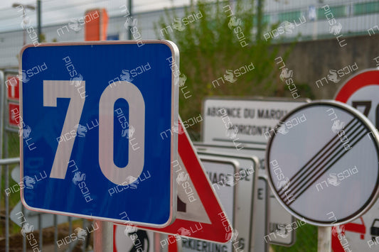 Speed limit and end of restriction signs in Contern, Luxembourg