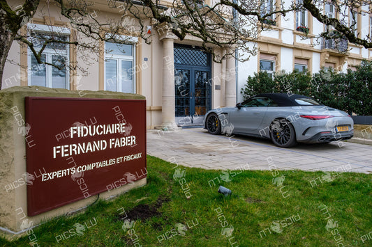 Fiduciaire Fernand Faber Entrance With Luxury Car