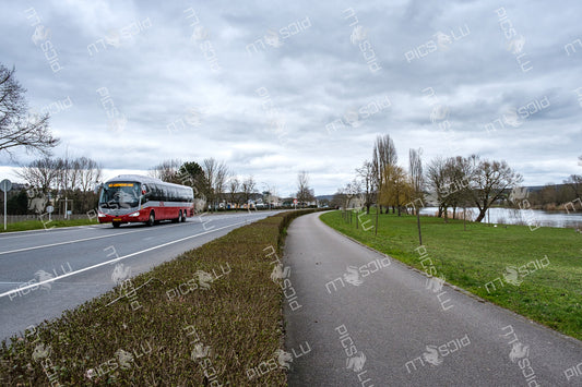 CFL bus on route 621 passing by the Alzette river in Mersch