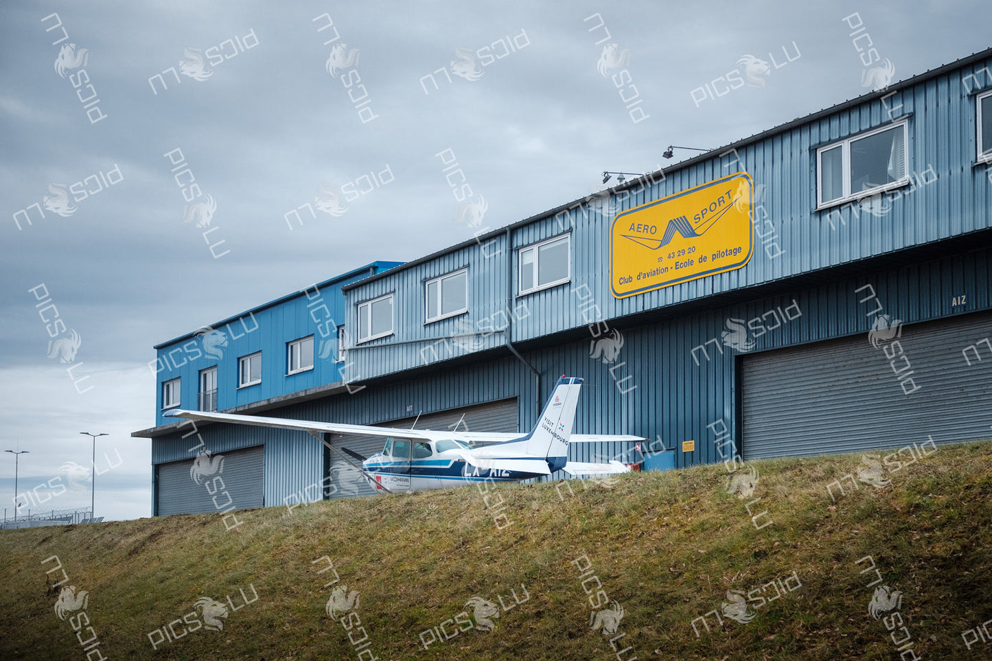 Aero-Sport flight school hangar with light aircraft in Luxembourg