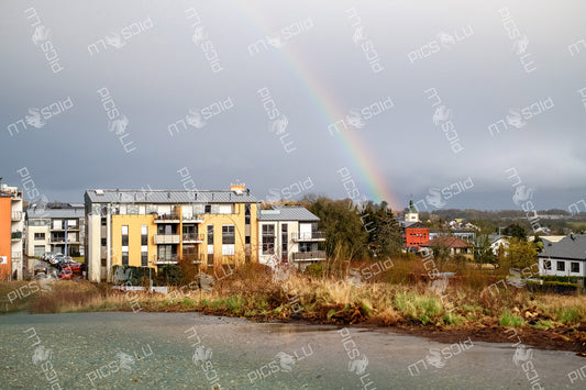 Rainbow over residential area in Luxembourg