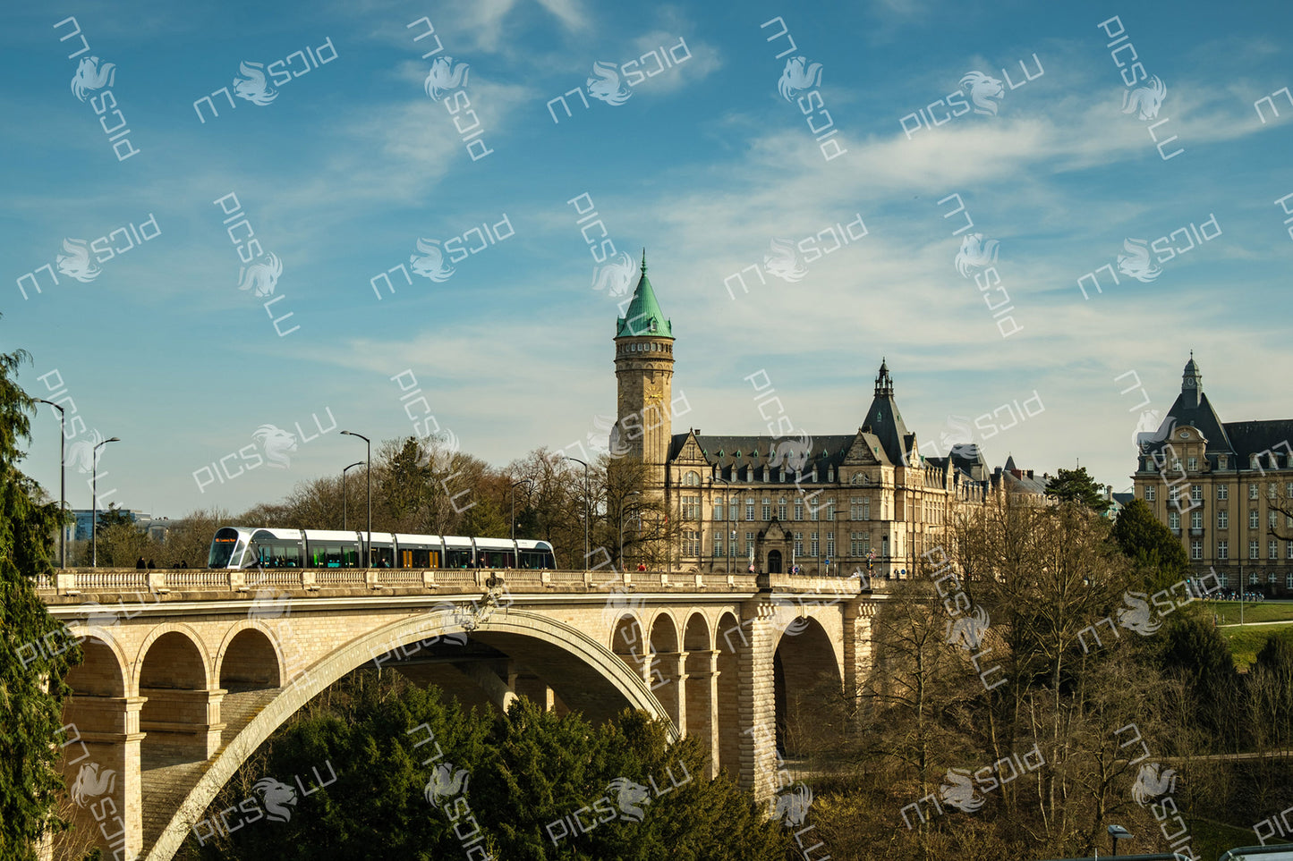 Tram crossing Adolphe Bridge in Luxembourg City