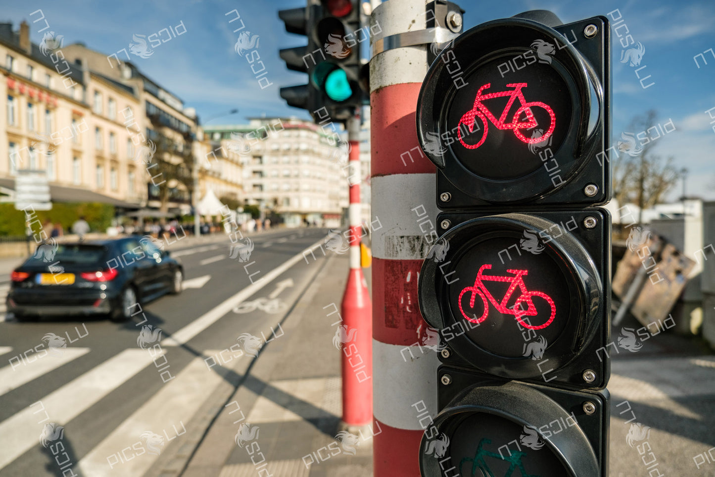 Red bicycle traffic Light at Avenue de la Liberté, Luxembourg