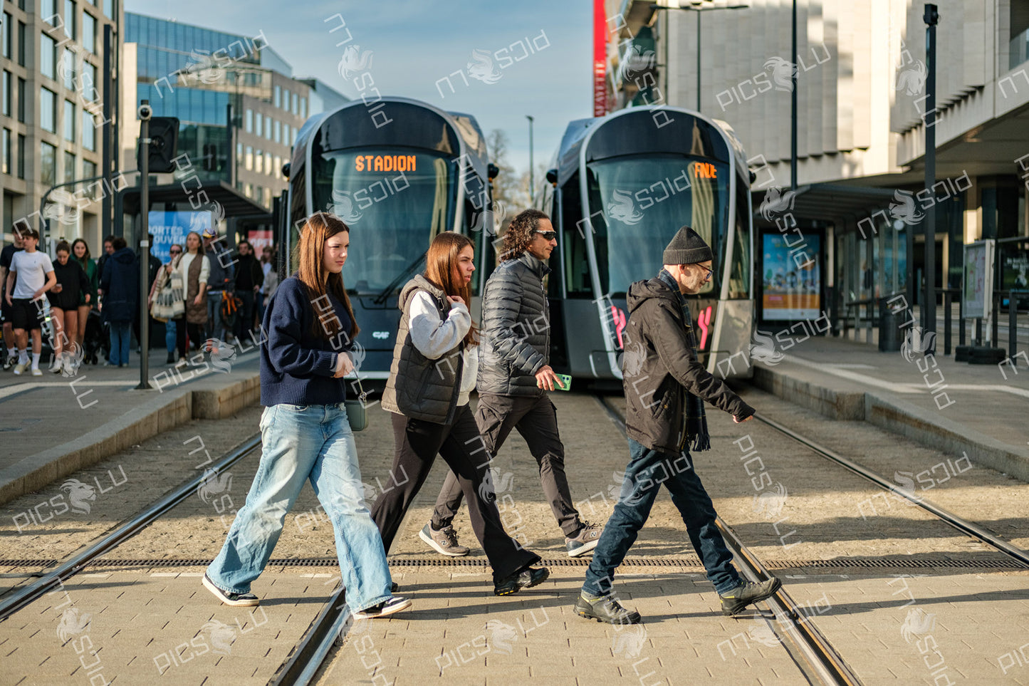 Pedestrians crossing tracks in Luxembourg city