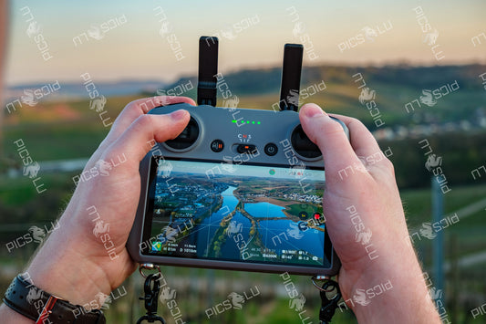 Aerial view of the Moselle river on drone controller in Remich