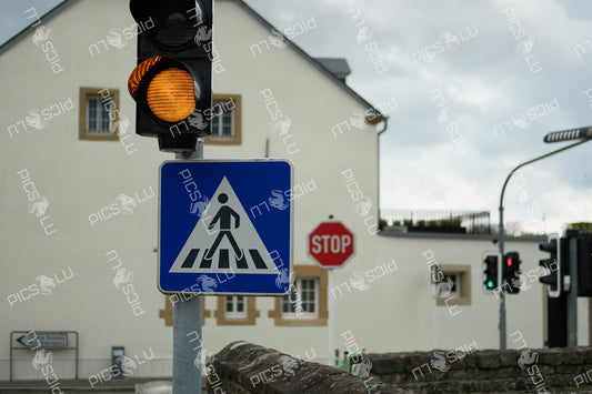 Pedestrian crossing sign and traffic lights in Sandweiler