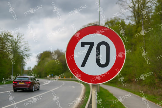 Speed limit sign on road near Sandweiler