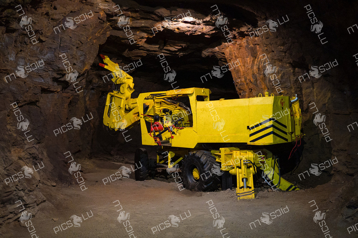 Underground drilling machine in a historical mining tunnel