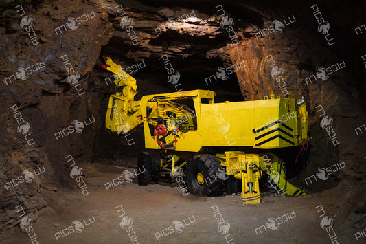 Underground drilling machine in a historical mining tunnel