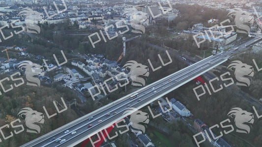 Aerial view of Grand Duchess Charlotte Bridge with traffic and Pfaffenthal Panoramic Lift, Luxembourg City