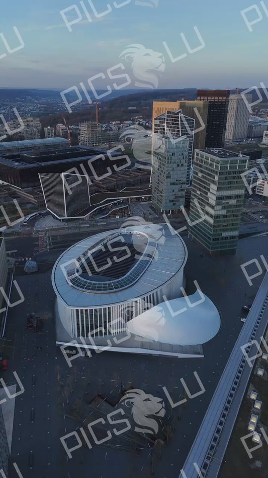 Philharmonie Luxembourg at Sunset: Aerial View of Modern Architecture in European Financial District