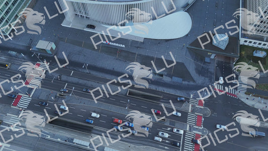 Top-down aerial view of Philharmonie Luxembourg roof, modern white architecture, drone shot